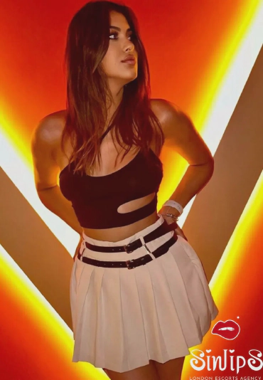 Rudolfa, London based escort in white skirt
