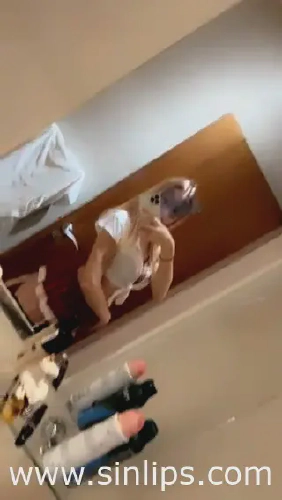 Wave a petite blonde escort based in London in school girl uniform showing her slim and busty body in this video